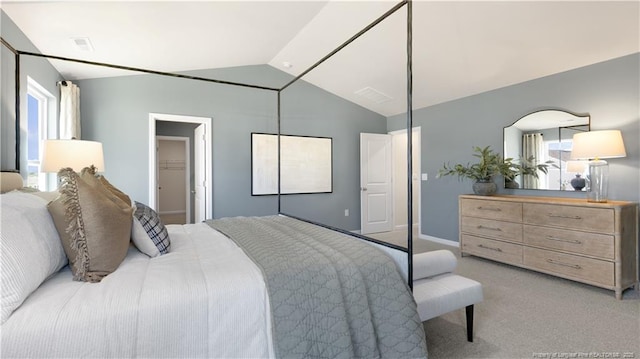 184 Hartfield Ave, Raeford, NC 28376 - bedroom with vaulted ceiling, light colored carpet, and baseboards