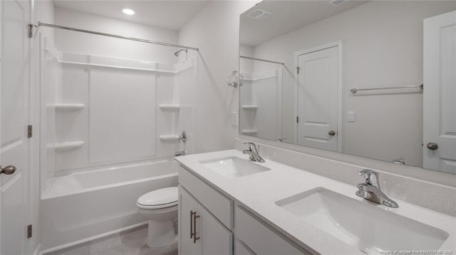 full bathroom with shower / bath combination, vanity, and toilet