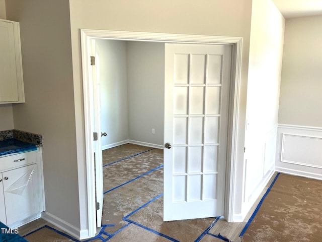 interior space featuring wainscoting