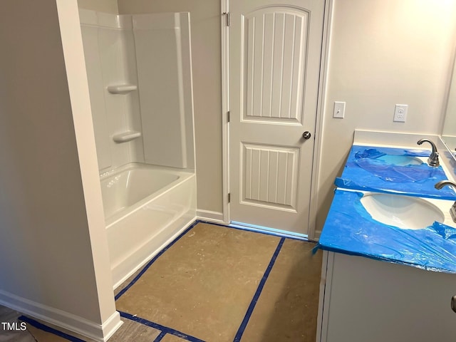 full bathroom featuring concrete floors, double vanity, and shower / washtub combination