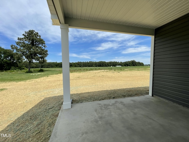 316 Olivia Crossing Ct Unit 11, Four Oaks, NC 27524 - view of patio with a rural view