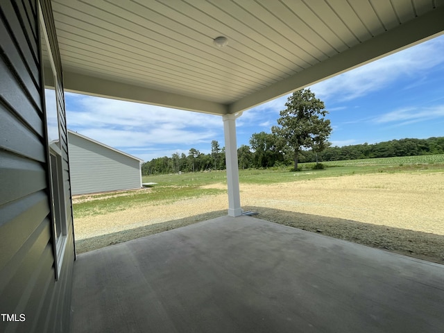 316 Olivia Crossing Ct Unit 11, Four Oaks, NC 27524 - view of patio with view of wooded area