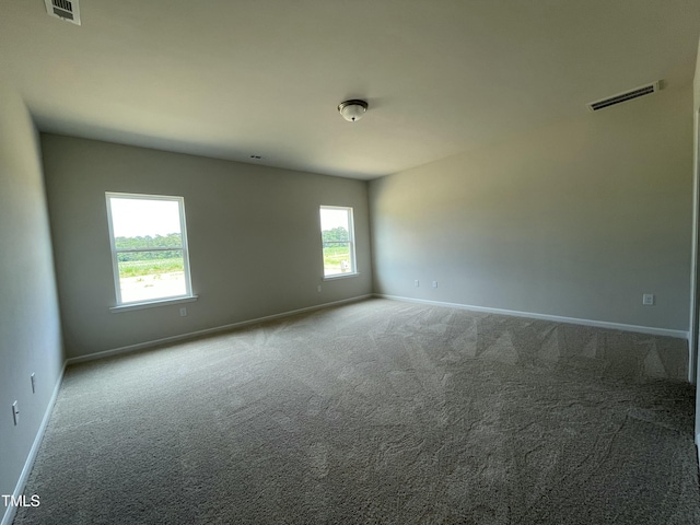 316 Olivia Crossing Ct Unit 11, Four Oaks, NC 27524 - carpeted spare room featuring baseboards