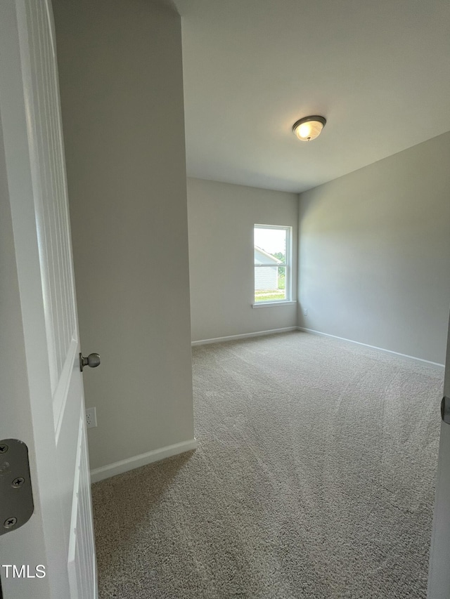 316 Olivia Crossing Ct Unit 11, Four Oaks, NC 27524 - spare room featuring carpet flooring and baseboards