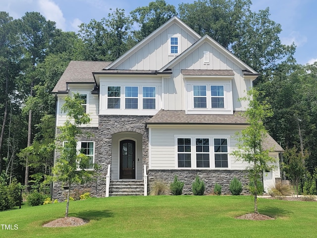 664 The Parks Dr, Pittsboro, NC 27312 - craftsman house with stone siding, board and batten siding, and roof with shingles