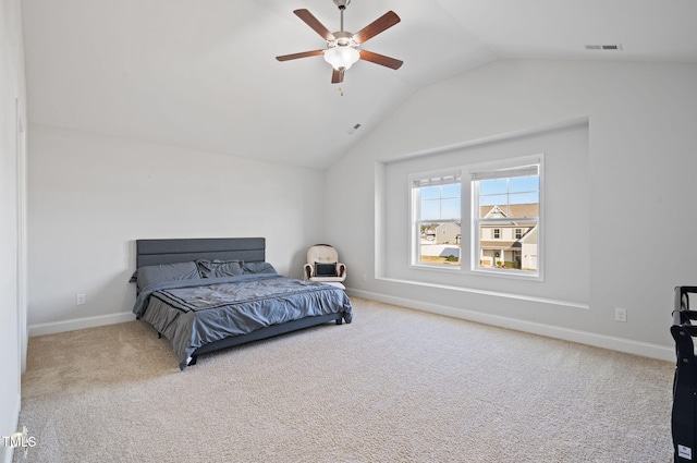 bedroom with carpet flooring, baseboards, visible vents, lofted ceiling, and ceiling fan