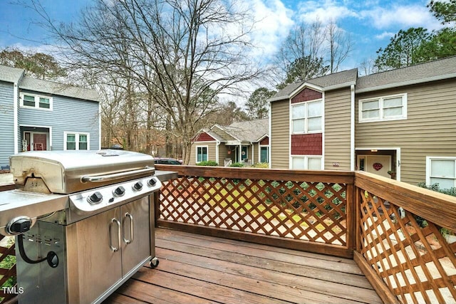 wooden terrace with grilling area