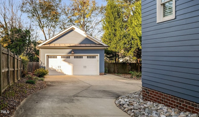 detached garage with fence