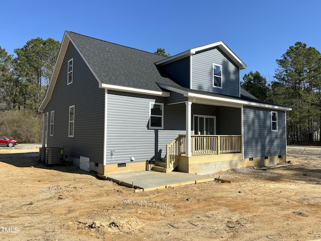 162 Kirkwall Ln, Selma, NC 27576 - view of front of property featuring central AC unit, crawl space, a shingled roof, and covered porch