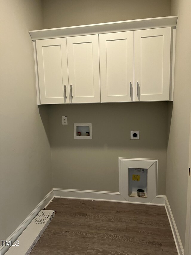 162 Kirkwall Ln, Selma, NC 27576 - laundry room featuring cabinet space, dark wood finished floors, washer hookup, and hookup for an electric dryer