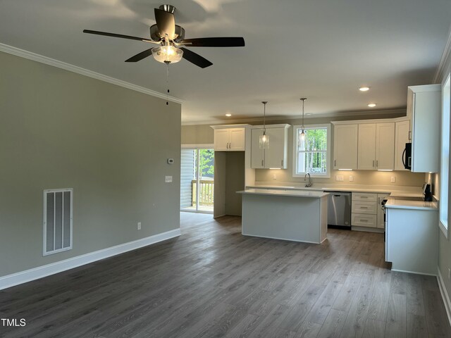 162 Kirkwall Ln, Selma, NC 27576 - kitchen featuring stainless steel dishwasher, visible vents, crown molding, black microwave, and a kitchen island