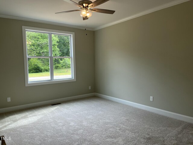 162 Kirkwall Ln, Selma, NC 27576 - unfurnished room featuring plenty of natural light, ornamental molding, baseboards, and ceiling fan