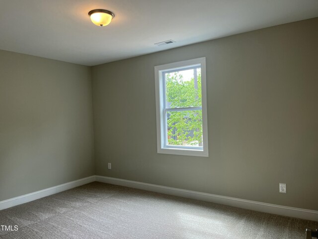 162 Kirkwall Ln, Selma, NC 27576 - carpeted spare room with baseboards and visible vents