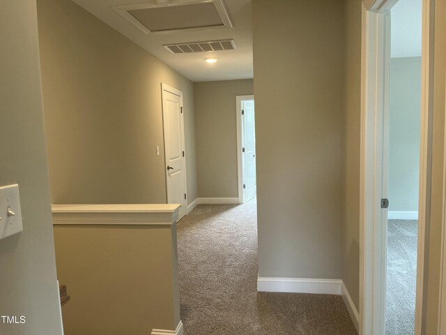 162 Kirkwall Ln, Selma, NC 27576 - corridor with attic access, carpet floors, visible vents, and baseboards