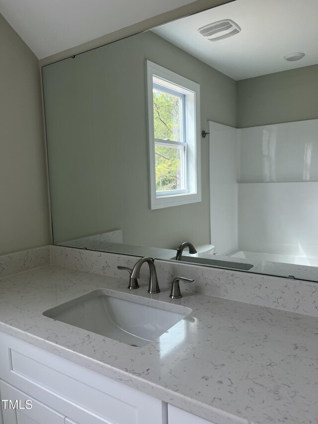 162 Kirkwall Ln, Selma, NC 27576 - bathroom with visible vents and vanity