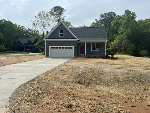 162 Kirkwall Ln, Selma, NC 27576 - view of front of property featuring driveway and covered porch