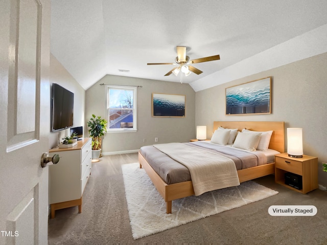 bedroom featuring lofted ceiling, light colored carpet, visible vents, and baseboards