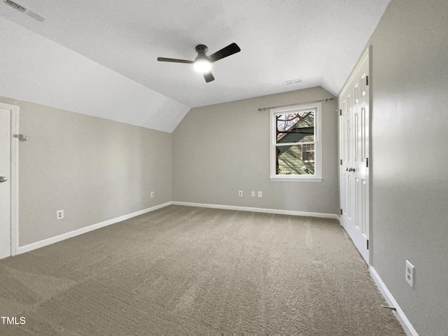 308 Trimble Ave, Cary, NC 27511 - additional living space featuring lofted ceiling, a ceiling fan, and carpet flooring