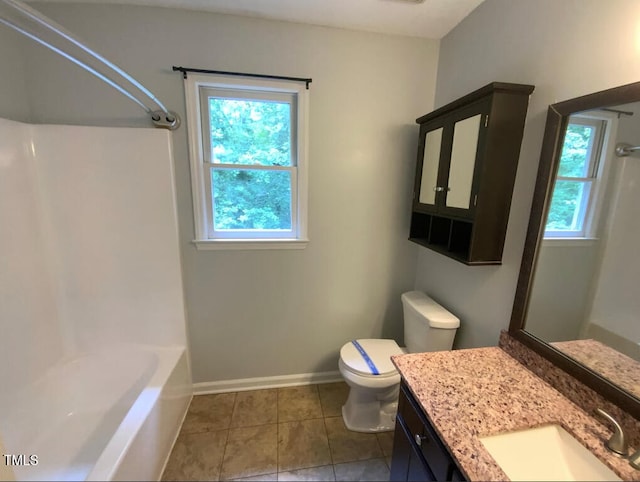 308 Trimble Ave, Cary, NC 27511 - full bath with vanity, tile patterned flooring, and washtub / shower combination