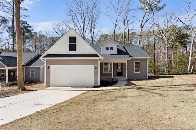 view of front facade with a front lawn and driveway