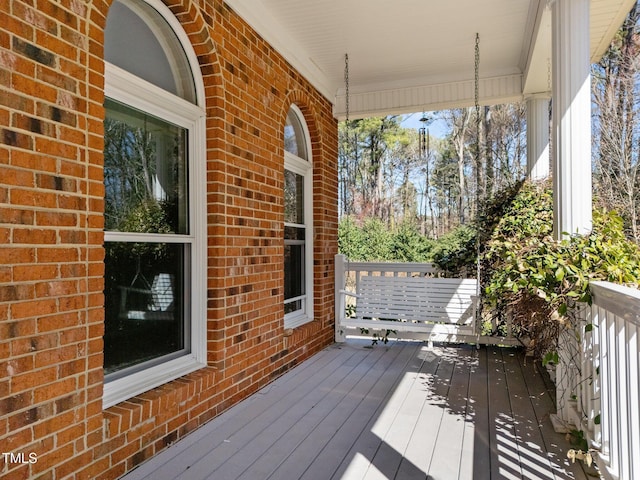 wooden terrace with covered porch