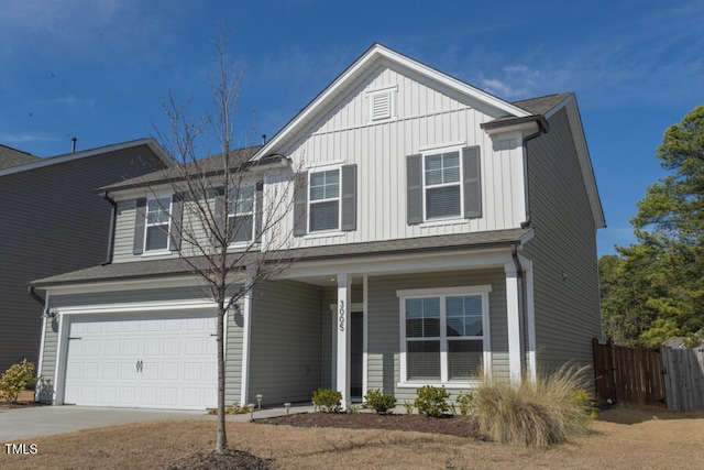 traditional-style home featuring central air condition unit, board and batten siding, fence, a garage, and driveway