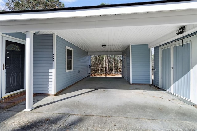 view of patio featuring an attached carport