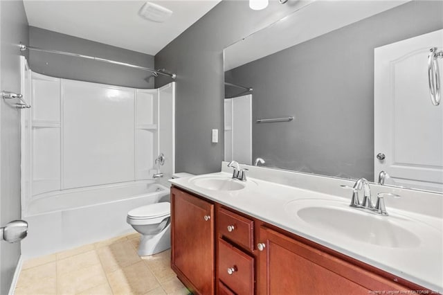 bathroom with washtub / shower combination, tile patterned flooring, a sink, and double vanity