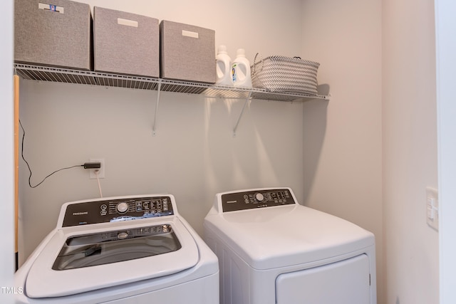 laundry room featuring laundry area and separate washer and dryer