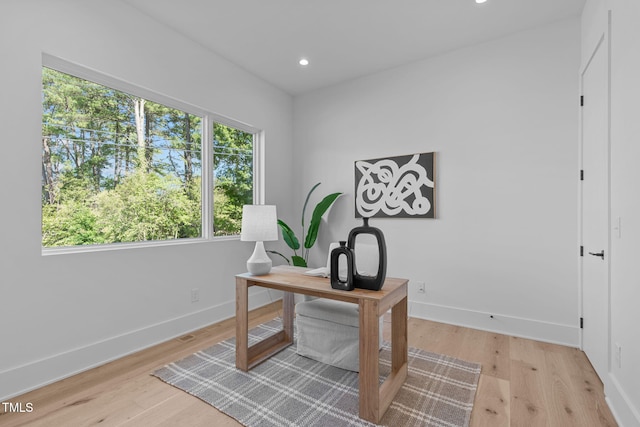 office featuring light wood-style floors, recessed lighting, and baseboards