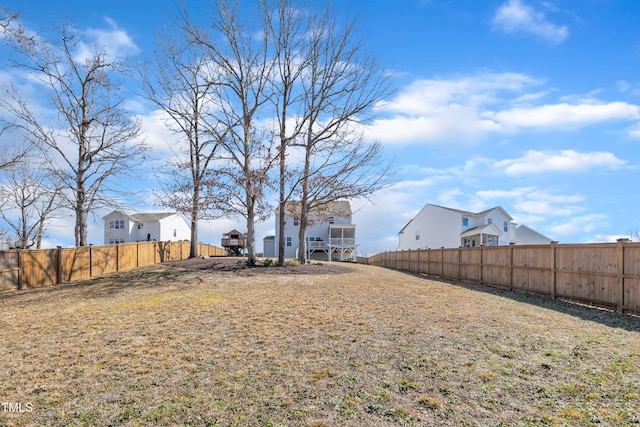 view of yard with a fenced backyard