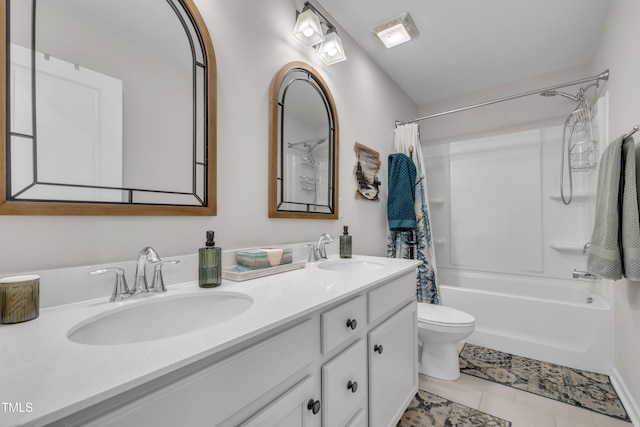 bathroom featuring double vanity, shower / tub combo, a sink, and tile patterned floors