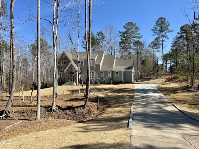 view of front of house featuring concrete driveway