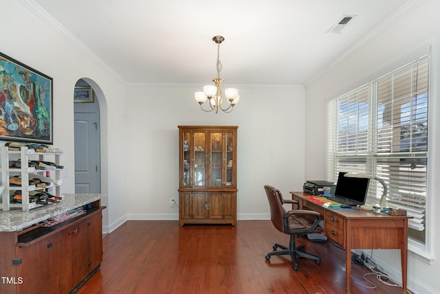 office space featuring arched walkways, dark wood finished floors, visible vents, ornamental molding, and baseboards