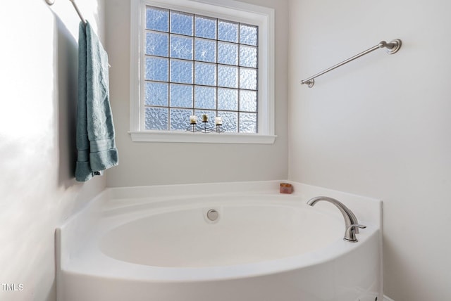 bathroom featuring a bath