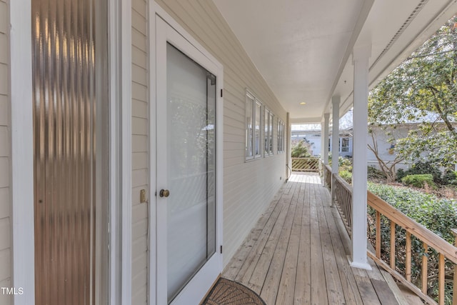 wooden deck featuring a porch