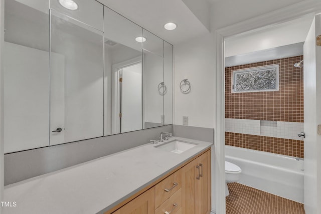 full bathroom with  shower combination, tile patterned flooring, vanity, and toilet