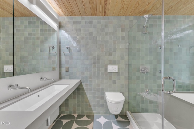 full bathroom featuring wooden ceiling, toilet, tile walls, tile patterned floors, and a stall shower