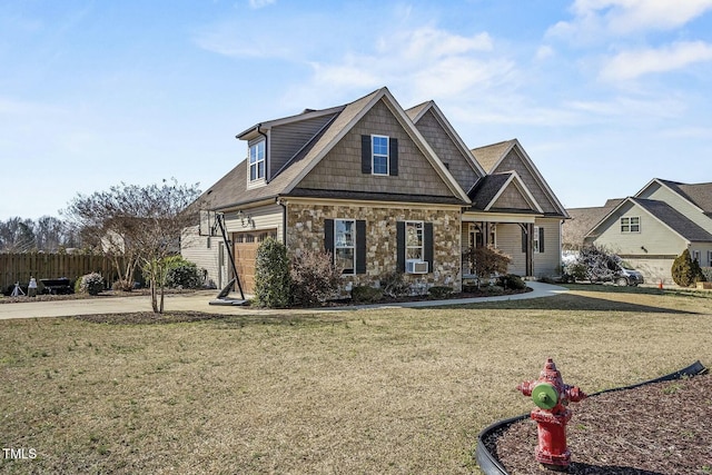 craftsman-style house with a front yard, stone siding, cooling unit, and fence