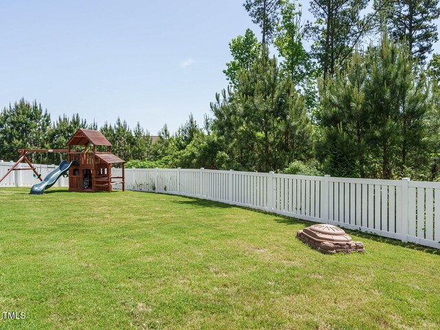 view of yard with a playground
