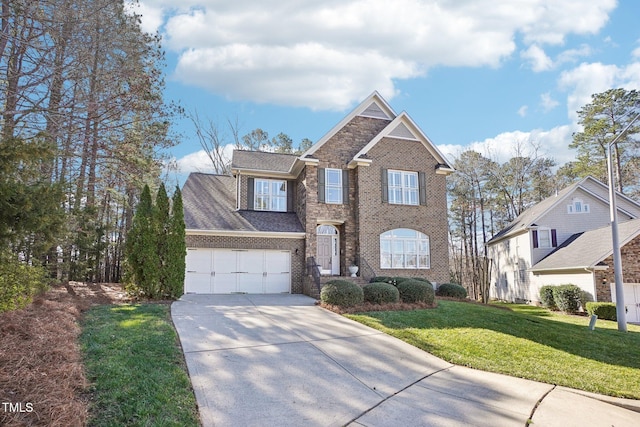 traditional-style house with brick siding, an attached garage, a front lawn, roof with shingles, and driveway