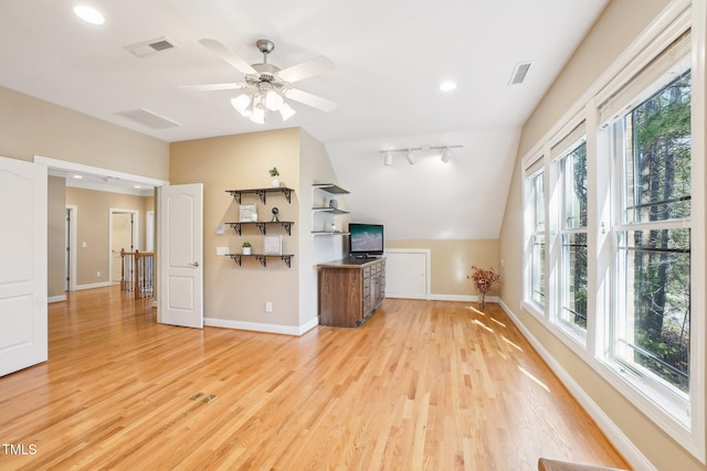 unfurnished living room with recessed lighting, light wood-style floors, visible vents, and baseboards