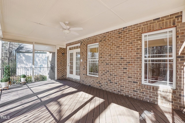 exterior space featuring a ceiling fan