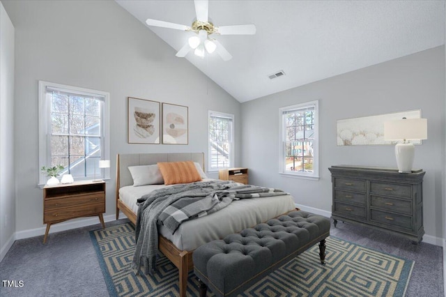 bedroom with high vaulted ceiling, dark carpet, visible vents, and baseboards