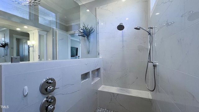 full bath featuring a tile shower