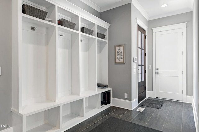 mudroom featuring crown molding, recessed lighting, and baseboards