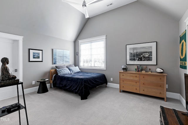 bedroom with lofted ceiling, baseboards, visible vents, and light colored carpet