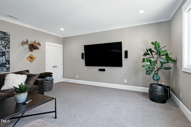 carpeted living room with crown molding, visible vents, and baseboards