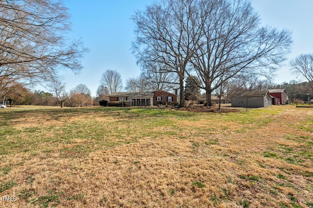 view of yard with a garage