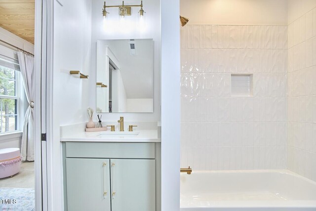 full bathroom with shower / bathing tub combination and vanity